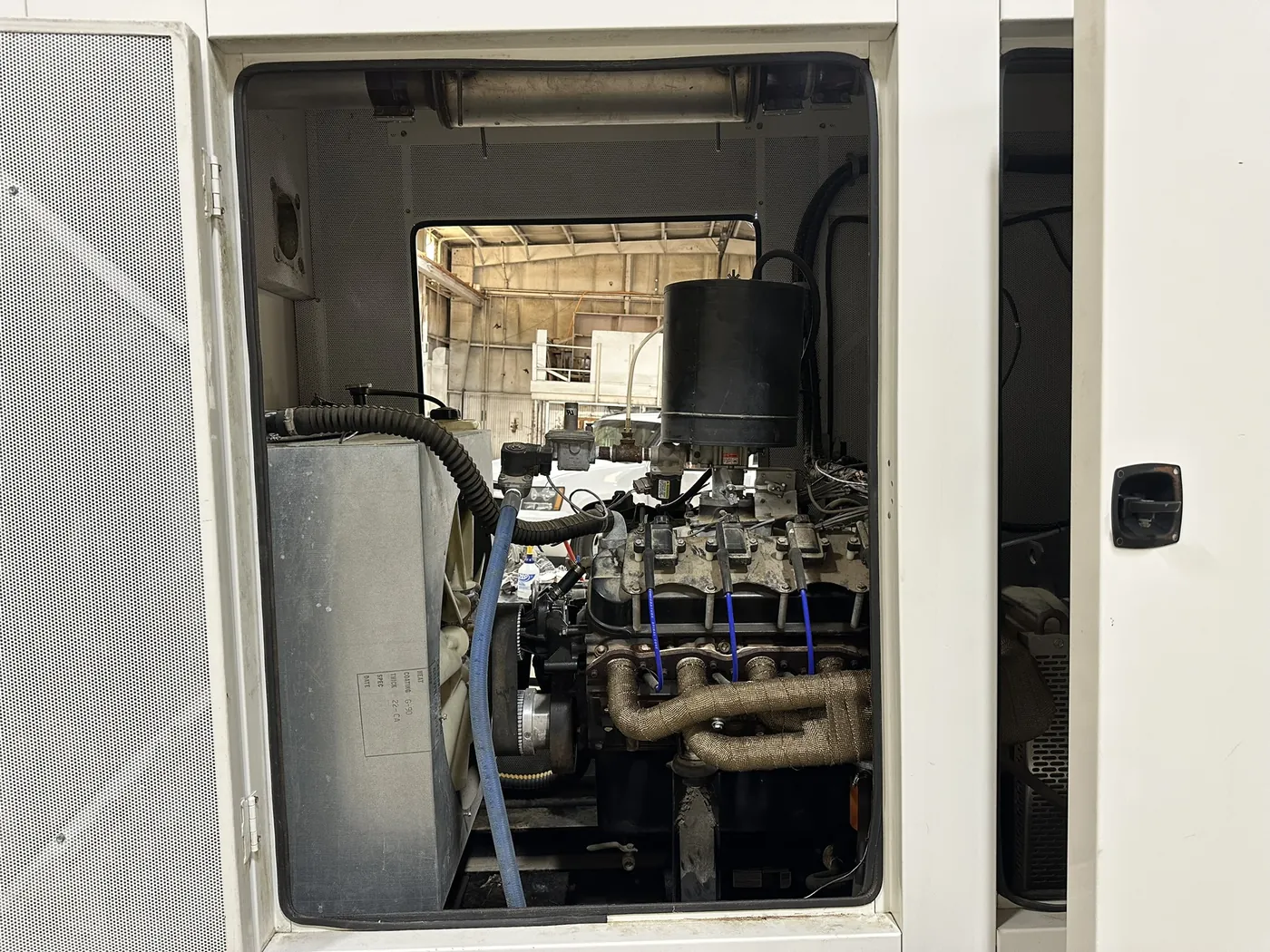 Engine side with the enclosure door open