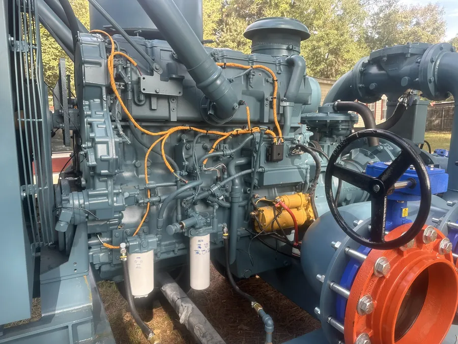 Engine and pump controls on a Caterpillar C15 pump unit.