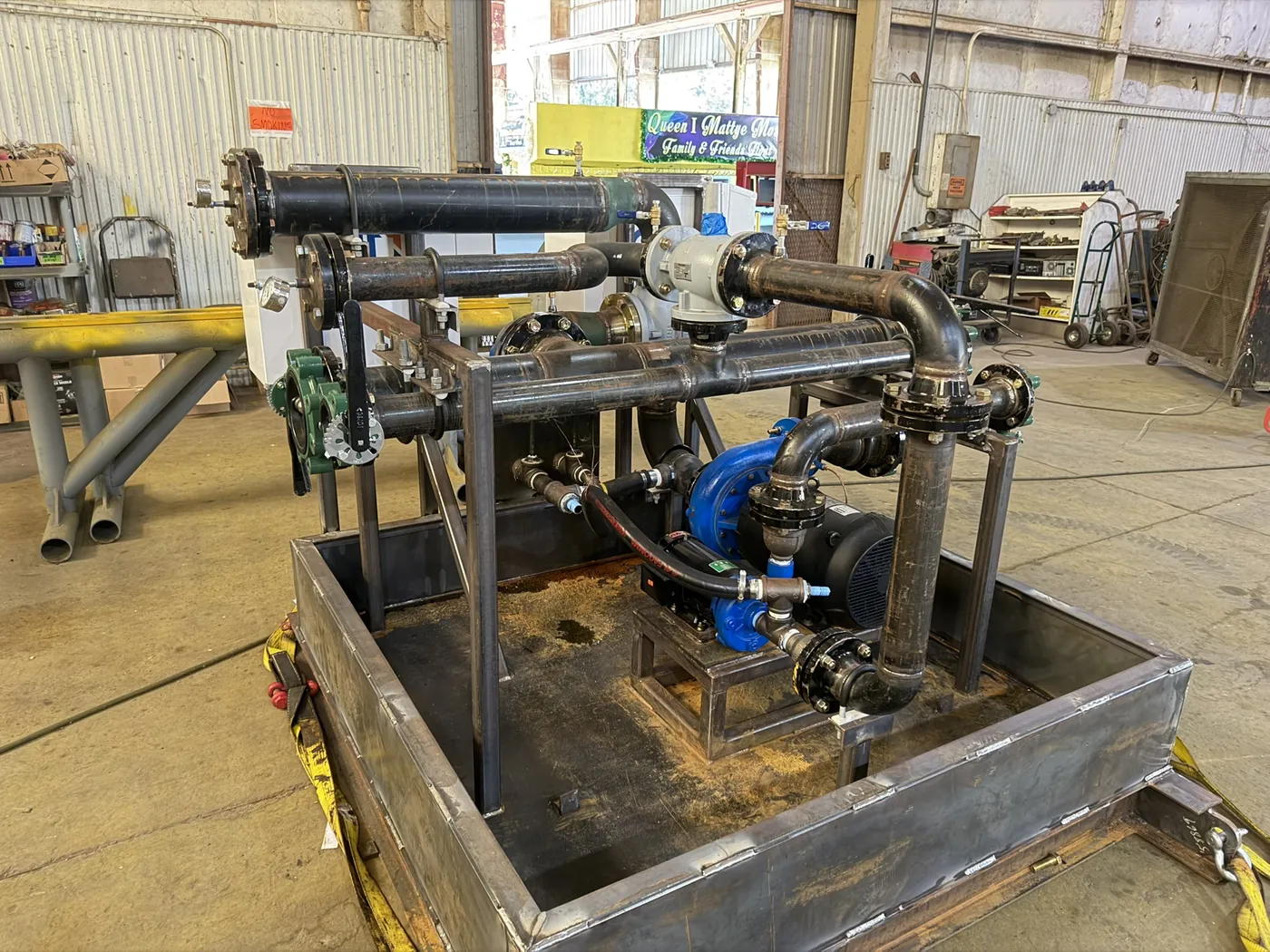 Frame, pump and first pipe spools going together