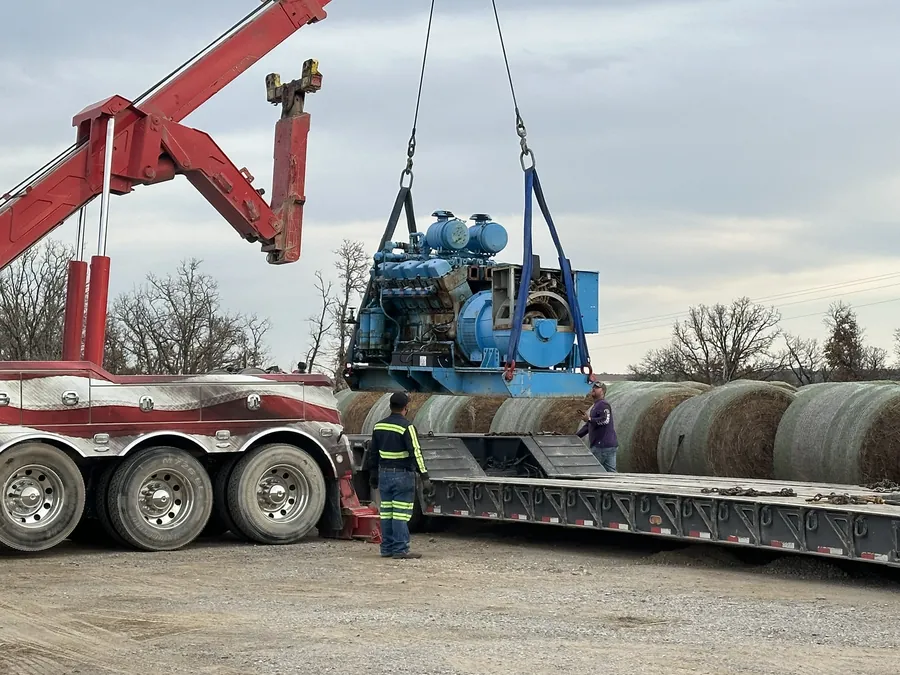 Loading a Waukesha L3711 natural gas engine.